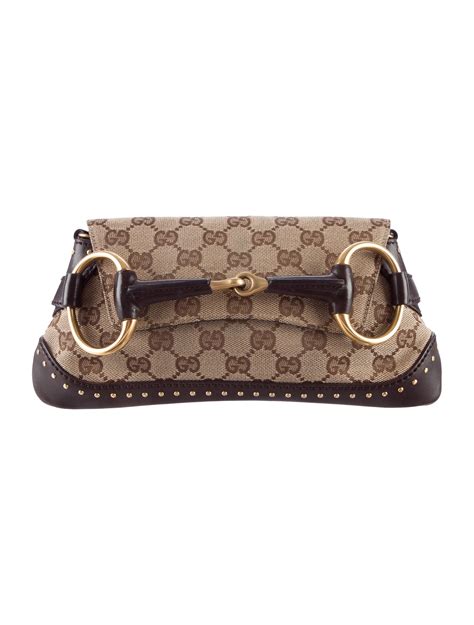 bague en or gucci|Gucci clutch bag.